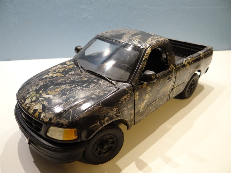 Illustration for article titled 1:18 Scale Camo F-150 by ERTL My first Live and Let Diecast! Review!